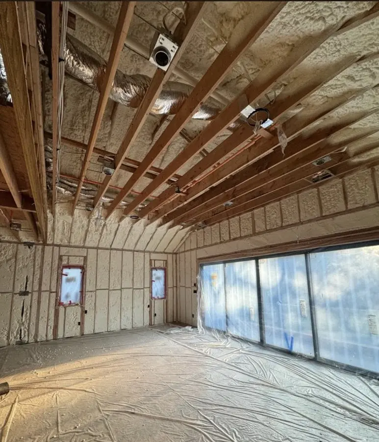 Interior walls and ceiling insulated with spray foam during new construction in Nassau Bay